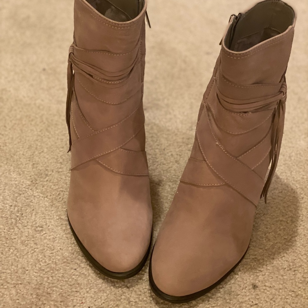 Vince Camuto taupe booties with fringe.